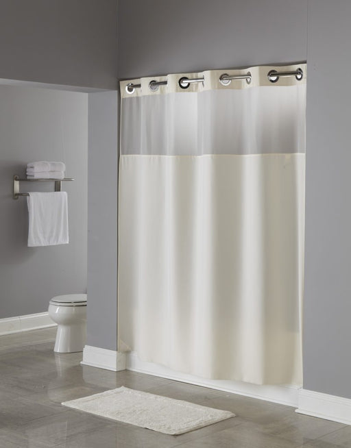 Illusion Hookless beige shower curtain with replaceable liner and translucent window. Polyester shower curtain with magnets. Price per dozen