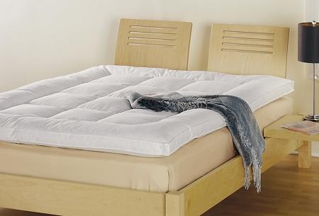75-25 Feather and down mattress topper. Featherbed by Down Inc. A luxurious every day essential.